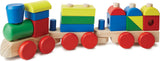 Colorful wooden toy train with block-like cars on a white background