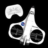 Space Shuttle Discovery with NASA logo and 'Discovery' branding, accompanied by a remote control on a black background.
