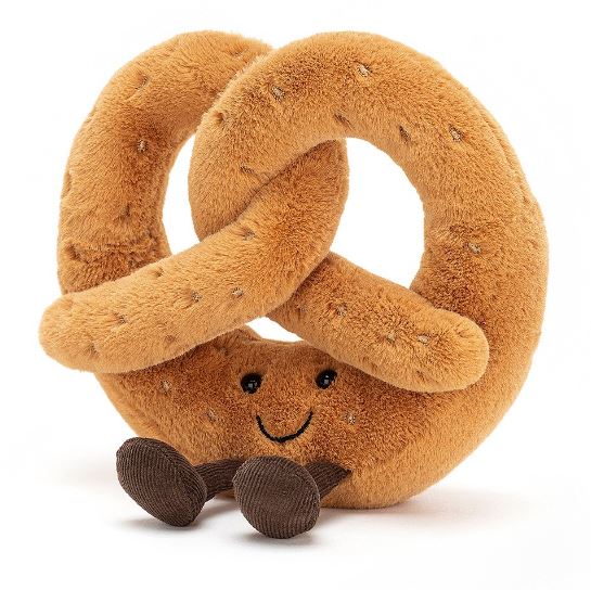 Amuseables Pretzel plush toy with a soft brown texture, friendly smiling face, and small dark feet, designed as a cute and cuddly kid's toy.