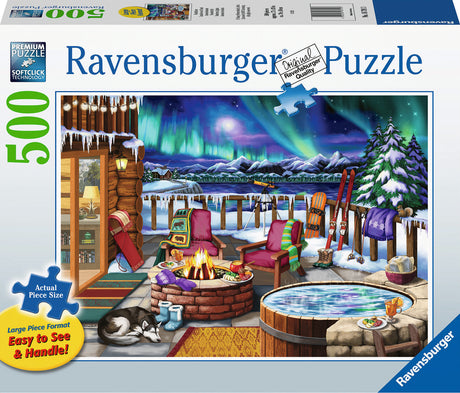Ravensburger Northern Lights 500 pc large format puzzle packaging with a winter scene featuring a fire pit, hot tub, and northern lights.