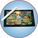 Jigsaw puzzle with tigers on a Roll Your Puzzle XXL , partially completed, on a blue background.