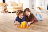 Two children playing Cat & Mouse - Game on a wooden floor in a living room.