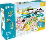 BRIO Builder Motor Set packaging with wooden building blocks and toys on a blue background