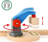 Toy train track component with blue and red handle labeled 'BRIO' on a white background.