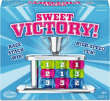 Board game box for 'Sweet Victory!' with colorful dice and trophy on a blue background