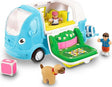 Toy Kitty Camper Van with open door, figures, and a dog on a white background