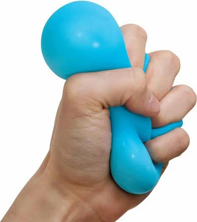 Blue NeeDoh Glow Nice Cube being squished by a hand