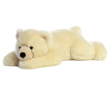 Plush polar bear toy lying on a white background