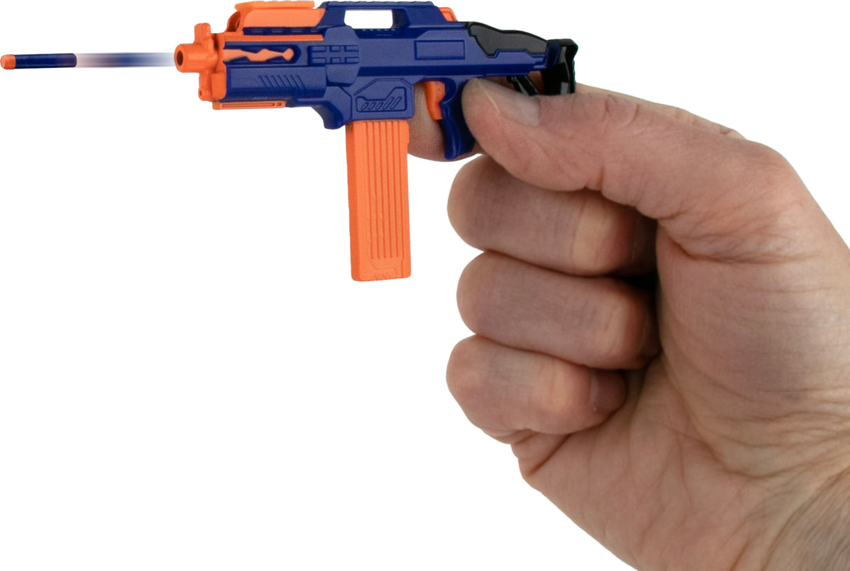 Hand holding a blue and orange World's Smallest Nerf Blasters against a white background