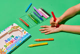 Body Doodlers 12 Face & Body Crayons on a green background