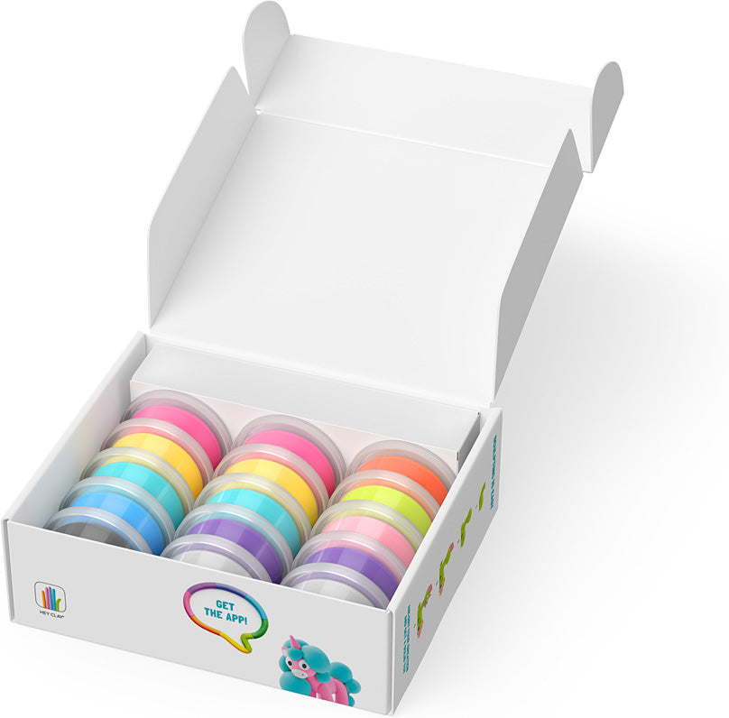 Box of colorful Hey Clay Rainbow Unicorns clay with a visible brand logo on a white background