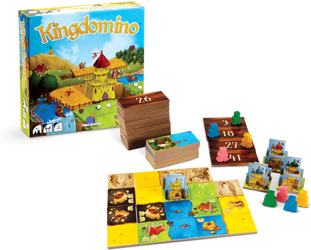 Kingdomino board game set with pieces and cards on a white background
