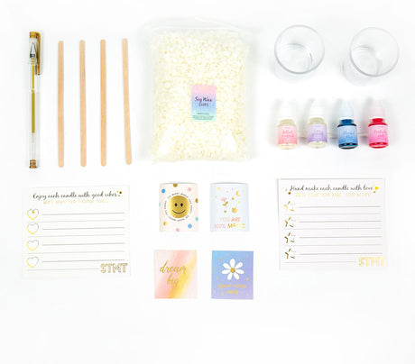 STMT D.I.Y Positivity Candles candle-making supplies including wicks, containers, and labels on a white background.
