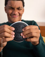 Person holding a large Oreo Squishi Toy