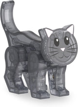 Magna-Tiles Pet Playhouse 50 Piece Set . Toy figure of a cat with a transparent body on a white background