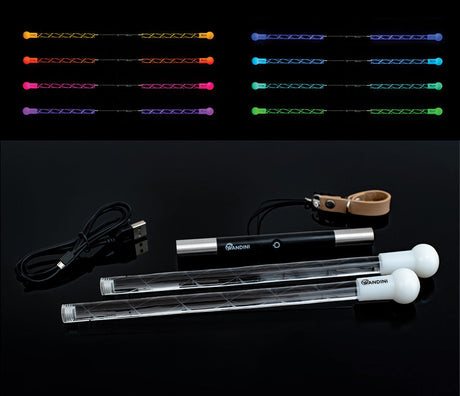 Wandini Glow.0 Magic LED Levitation Wand Light-up sticks with colorful lights and a power cable on a black background