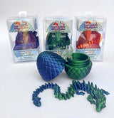 Colorful Twiddle Sensory Dragons with packaging on a white background