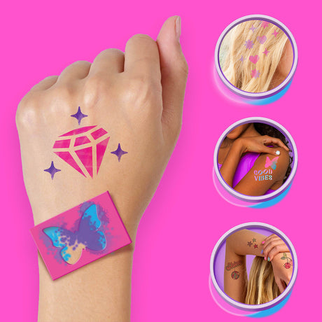 Temporary tattoos with a diamond and butterfly design on a hand, against a pink background.
