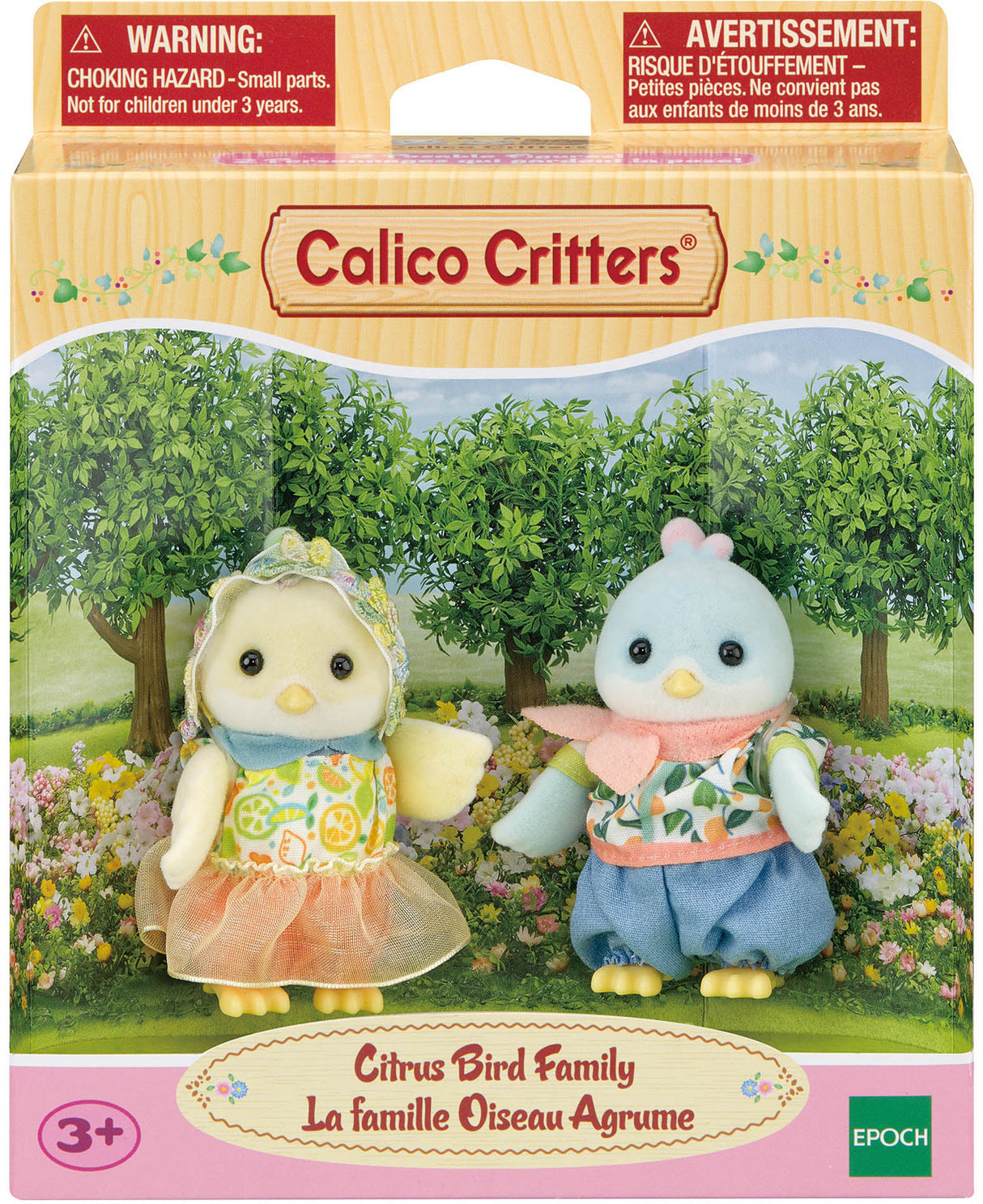 Calico Critters Citrus Bird Family featuring two small bird figurines dressed in colorful citrus-themed outfits standing in a garden setting with trees and flowers, suitable for children aged 3 and up.