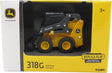 John Deere toy skid steer loader in packaging with Tomy branding