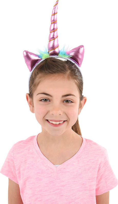 Child wearing a Metallic Unicorn Headband with a white background