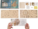 UGears Aero Clock model kit with packaging and components on a white background