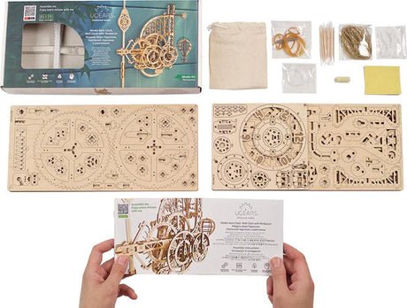 UGears Aero Clock model kit with packaging and components on a white background