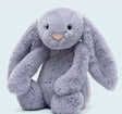 Bashful Viola Bunny Medium plush featuring soft, lavender fur with long floppy ears and a gentle expression, perfect as a cuddly toddler toy or gift.